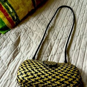 Houndstooth Clutch with strap from Barney’s NewYork